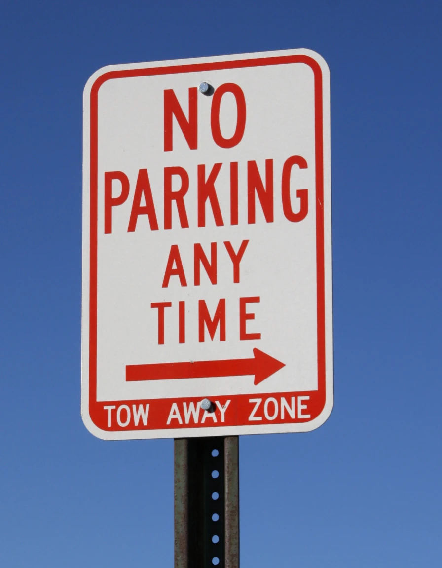 No parking any time tow away zone sign