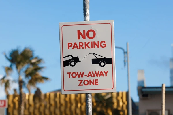 No parking tow-away zone sign